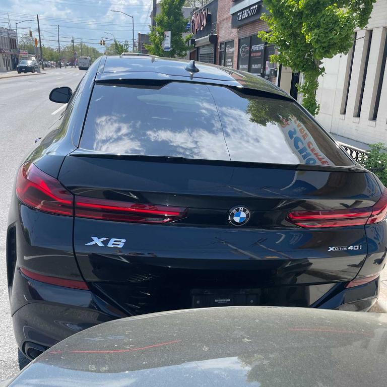 used 2022 BMW X6 car, priced at $59,551