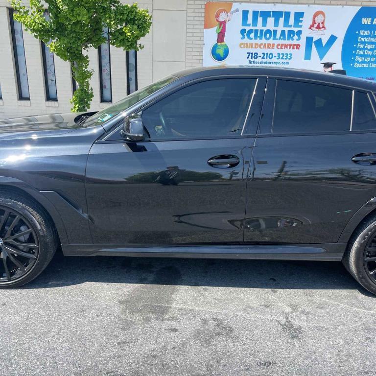 used 2022 BMW X6 car, priced at $59,551