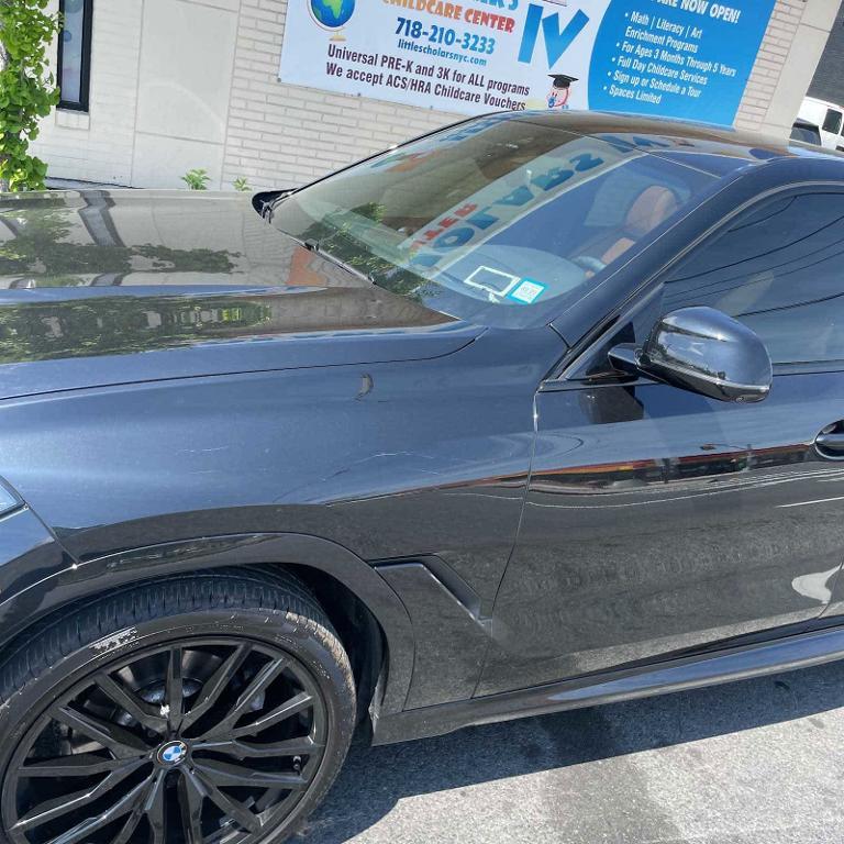 used 2022 BMW X6 car, priced at $59,551