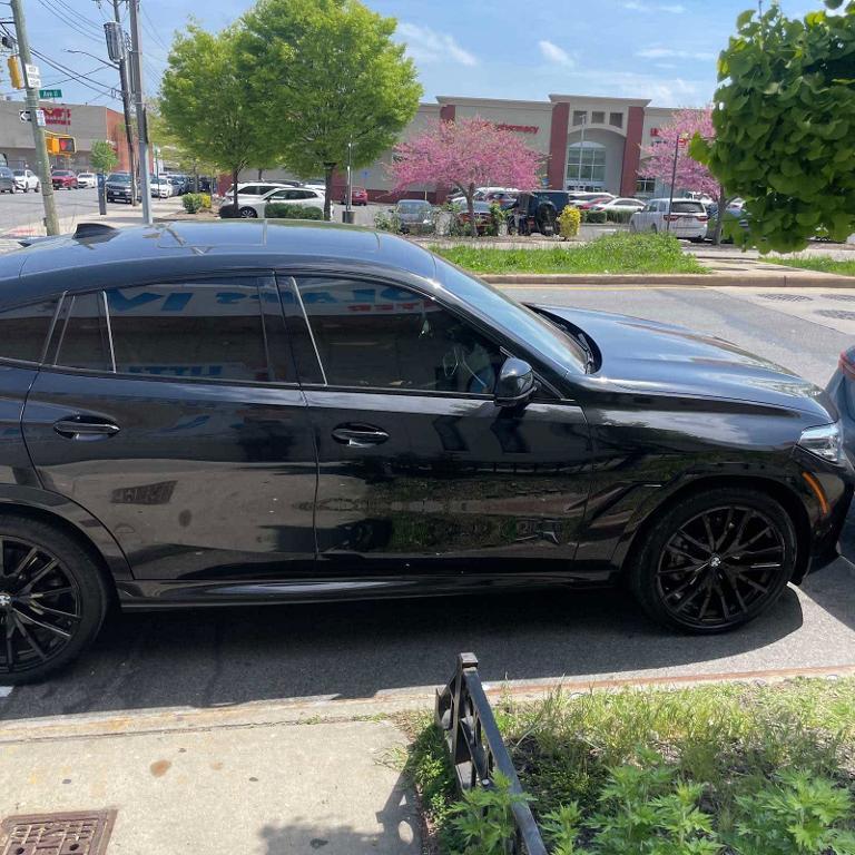 used 2022 BMW X6 car, priced at $59,551