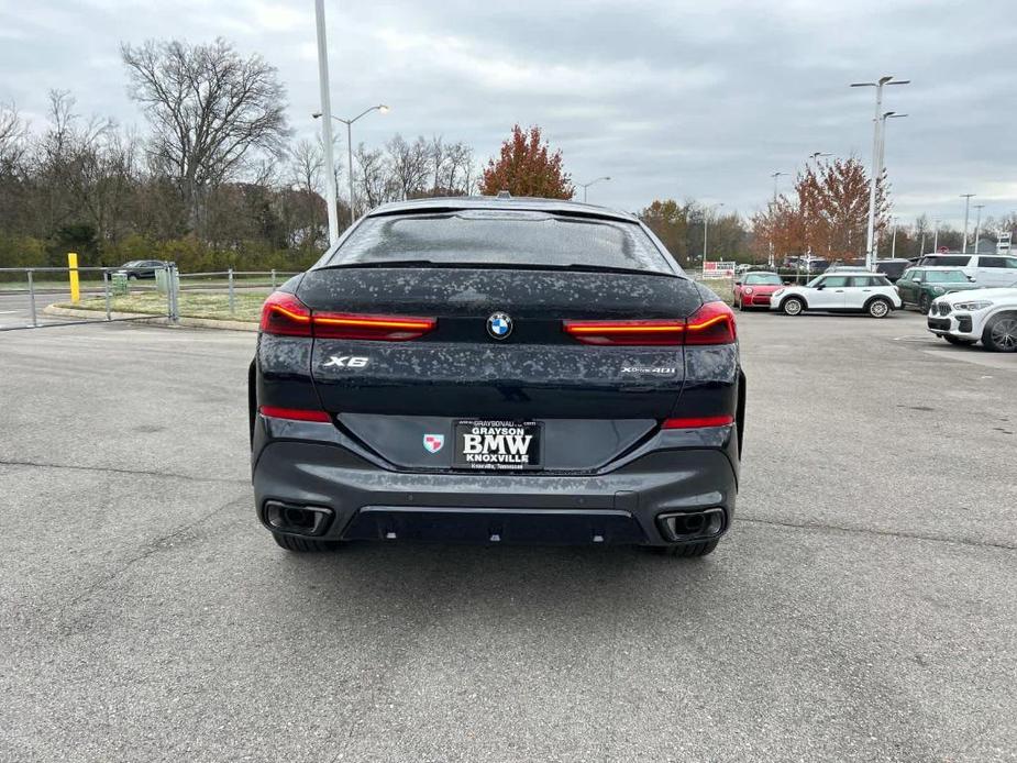 used 2025 BMW X6 car, priced at $83,770