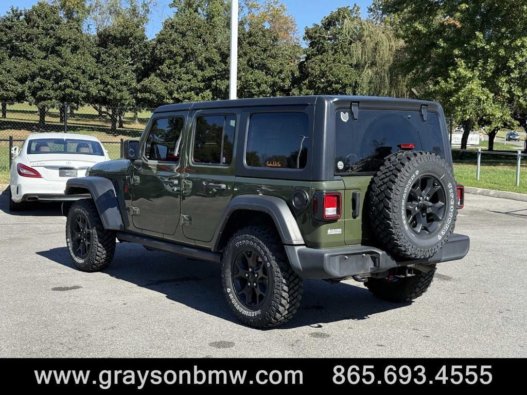 used 2021 Jeep Wrangler Unlimited car, priced at $32,768