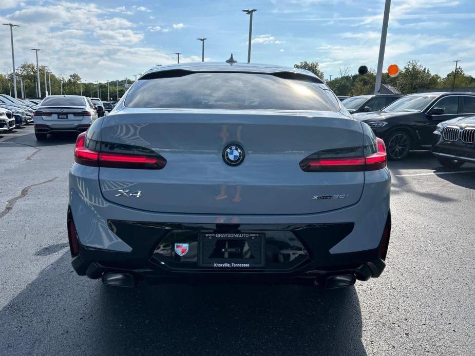 used 2024 BMW X4 car, priced at $54,870