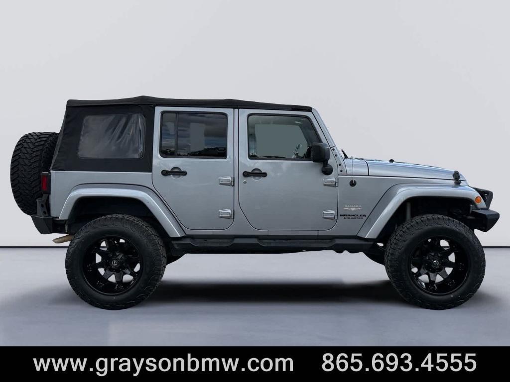 used 2015 Jeep Wrangler Unlimited car, priced at $21,585