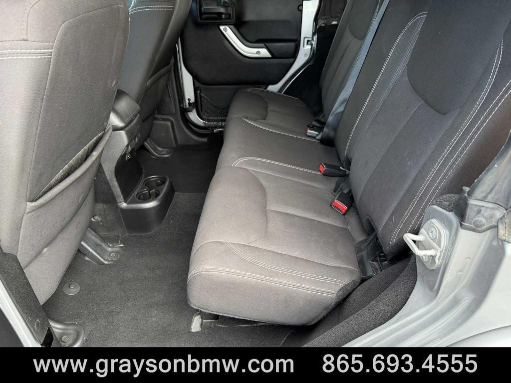used 2015 Jeep Wrangler Unlimited car, priced at $21,585