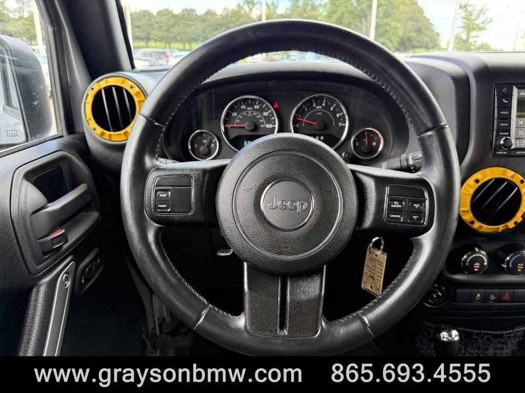 used 2015 Jeep Wrangler Unlimited car, priced at $21,585