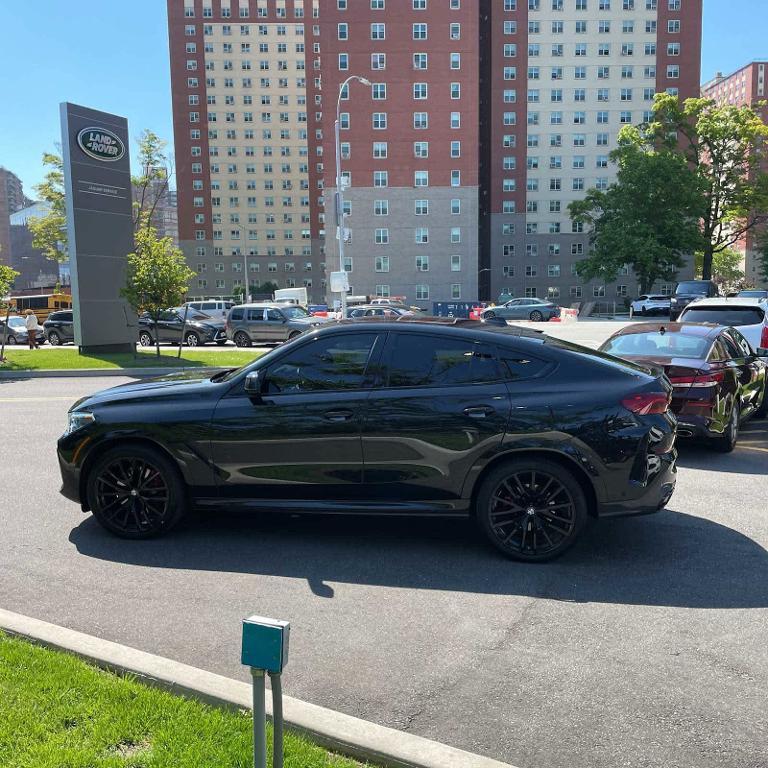 used 2023 BMW X6 car, priced at $59,995