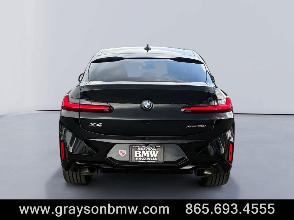 used 2024 BMW X4 car, priced at $52,995