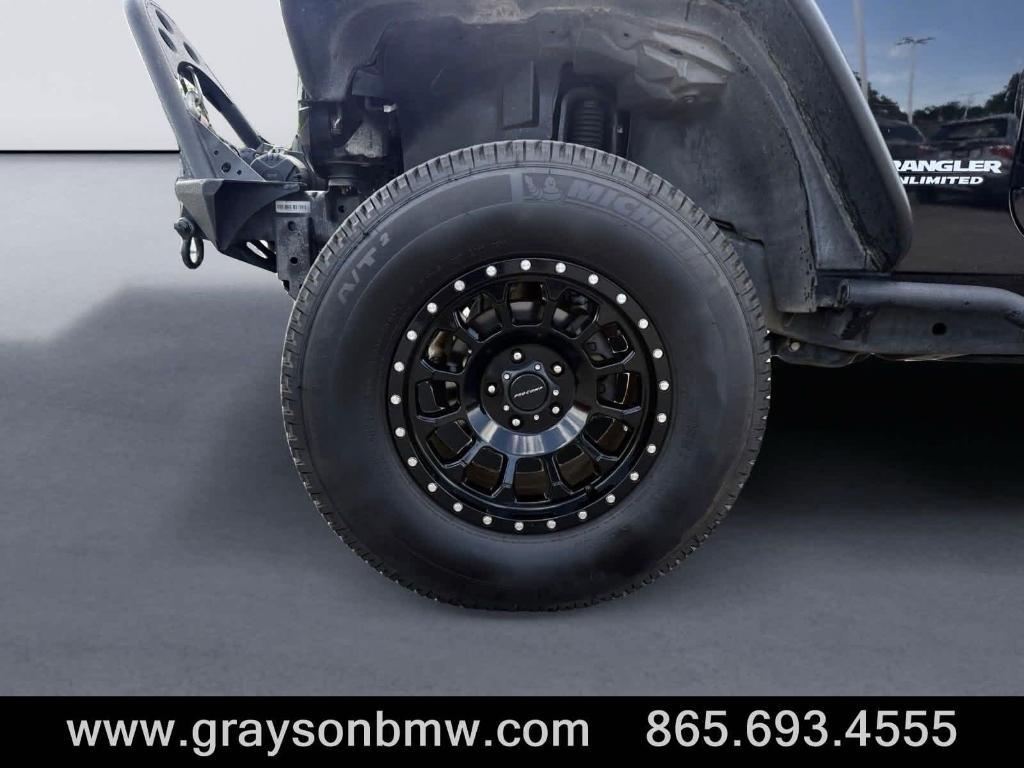 used 2011 Jeep Wrangler Unlimited car, priced at $15,378