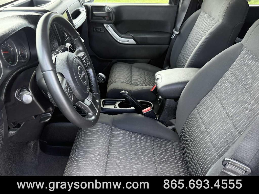 used 2011 Jeep Wrangler Unlimited car, priced at $15,378