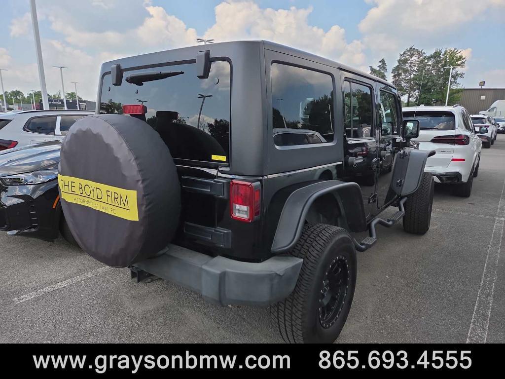 used 2011 Jeep Wrangler Unlimited car, priced at $15,378