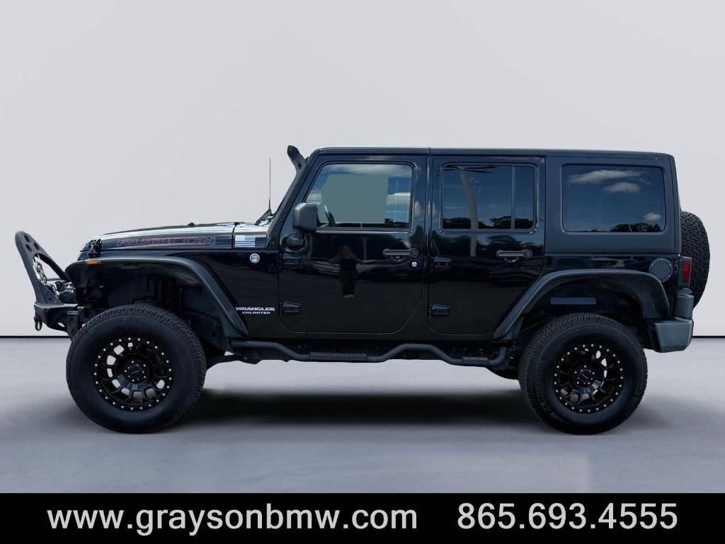used 2011 Jeep Wrangler Unlimited car, priced at $15,378