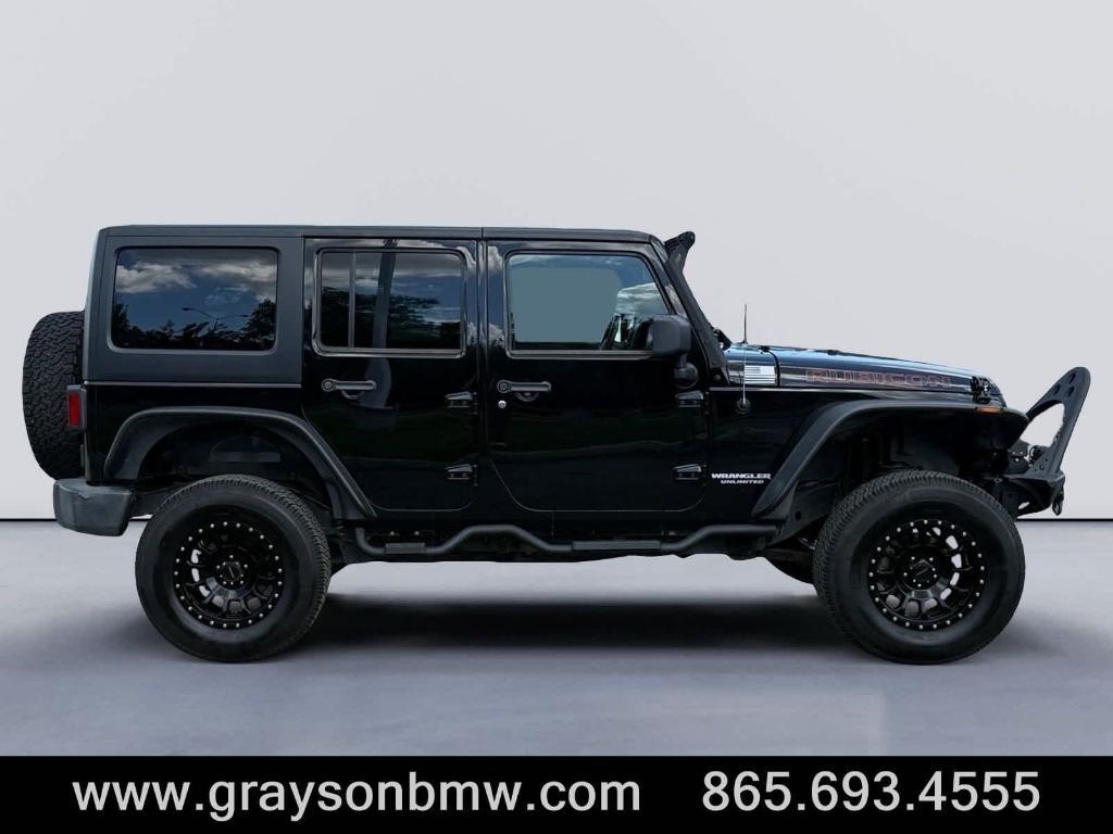 used 2011 Jeep Wrangler Unlimited car, priced at $15,378