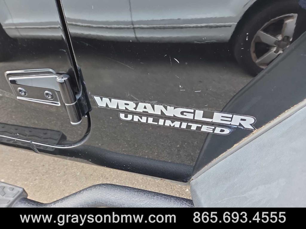 used 2011 Jeep Wrangler Unlimited car, priced at $15,378