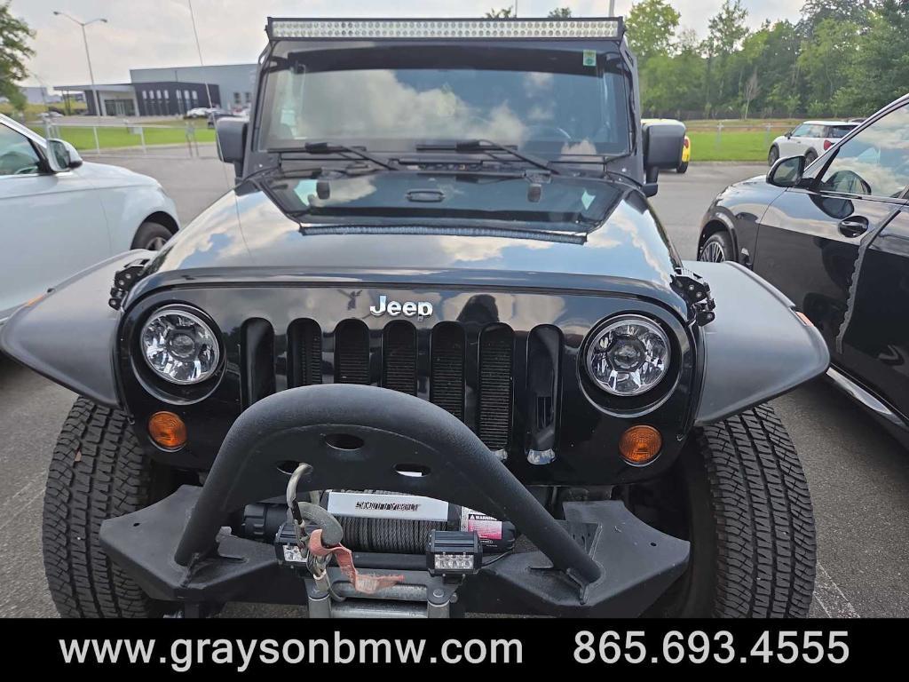 used 2011 Jeep Wrangler Unlimited car, priced at $15,378