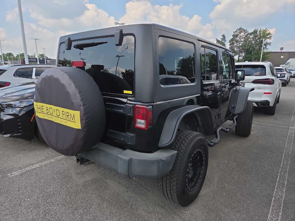 used 2011 Jeep Wrangler Unlimited car, priced at $15,995
