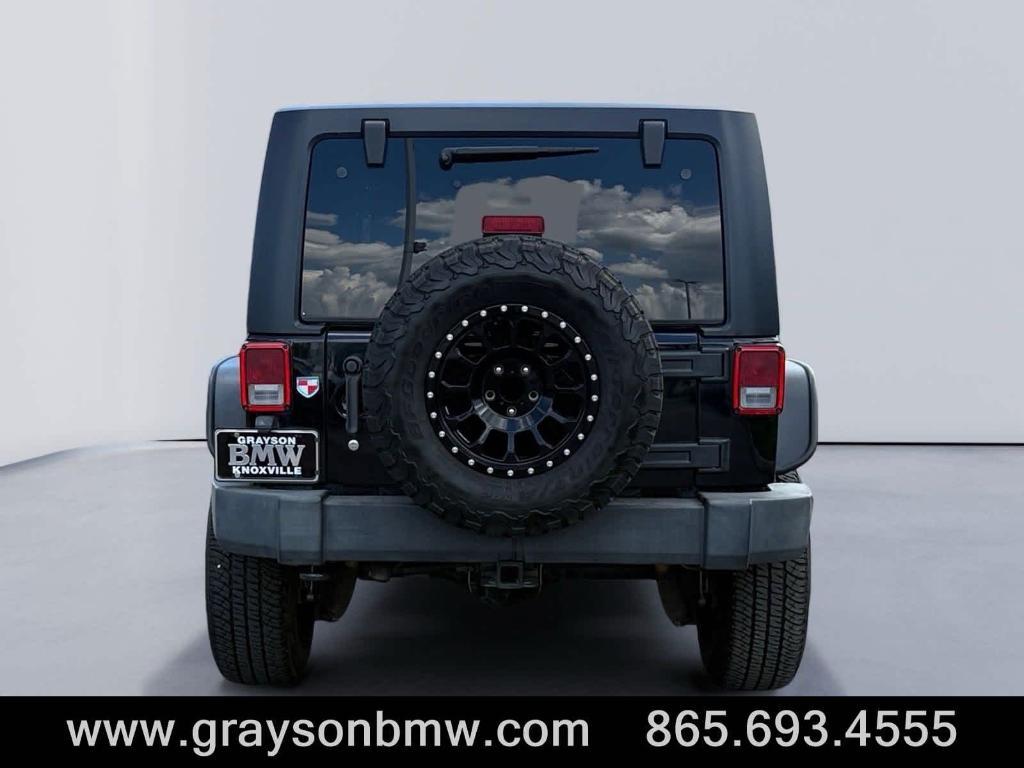 used 2011 Jeep Wrangler Unlimited car, priced at $15,378