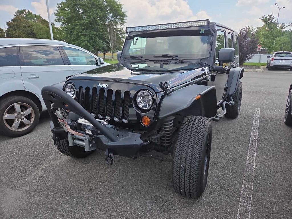 used 2011 Jeep Wrangler Unlimited car, priced at $15,995
