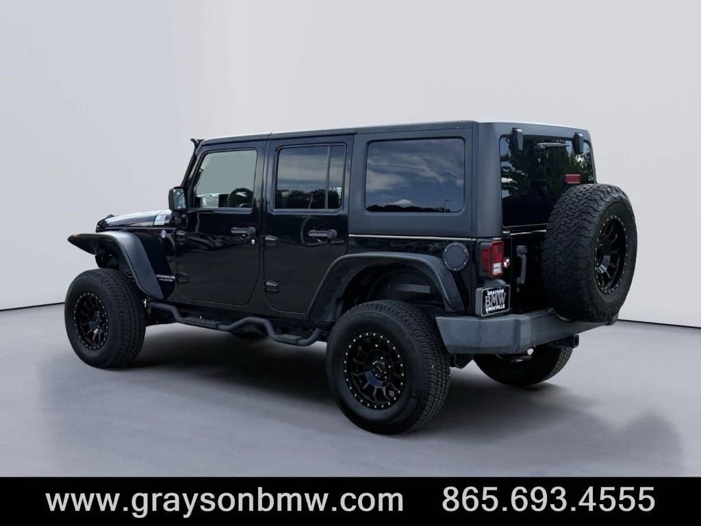 used 2011 Jeep Wrangler Unlimited car, priced at $15,378