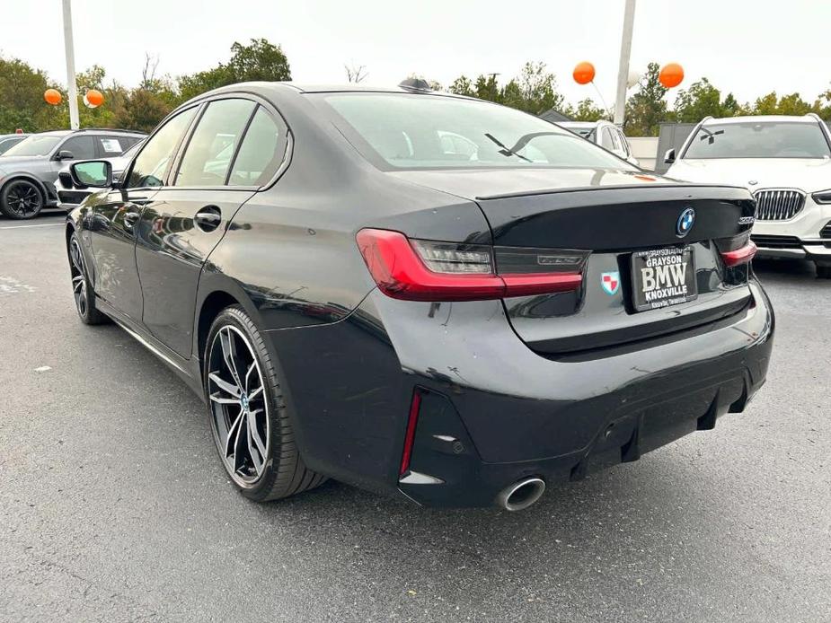 used 2023 BMW 330e car, priced at $34,091