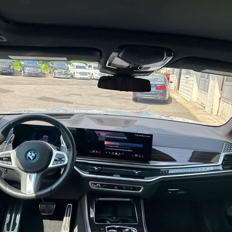 used 2024 BMW X5 PHEV car, priced at $79,999