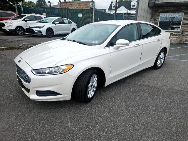 used 2013 Ford Fusion car, priced at $11,595