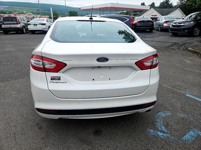 used 2013 Ford Fusion car, priced at $11,595