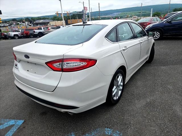 used 2013 Ford Fusion car, priced at $11,595