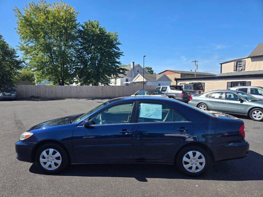 used 2002 Toyota Camry car, priced at $6,998