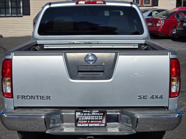 used 2009 Nissan Frontier car, priced at $10,998