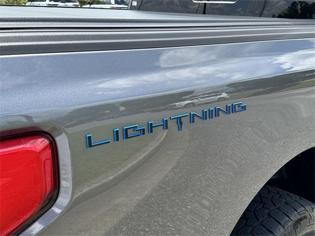 used 2022 Ford F-150 Lightning car, priced at $45,990