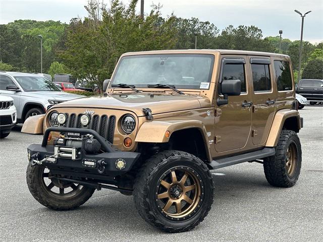 used 2011 Jeep Wrangler Unlimited car, priced at $17,841