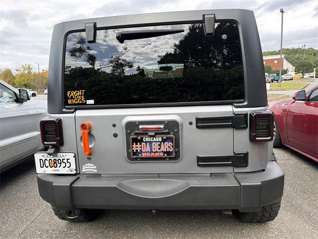 used 2015 Jeep Wrangler Unlimited car, priced at $15,635