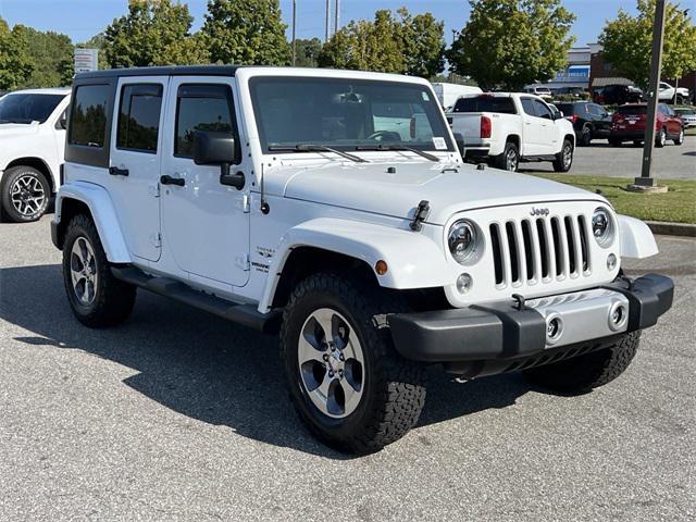 used 2016 Jeep Wrangler Unlimited car, priced at $21,207