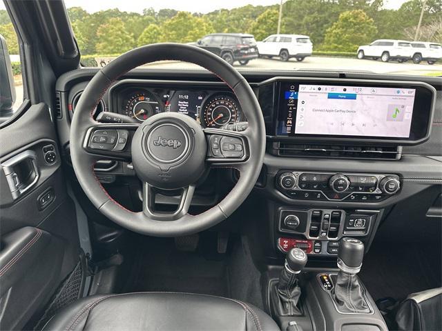 used 2024 Jeep Wrangler car, priced at $57,099