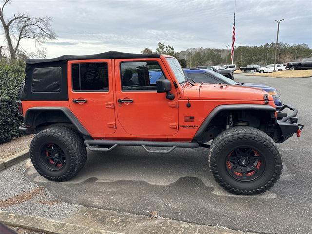 used 2015 Jeep Wrangler Unlimited car, priced at $18,125