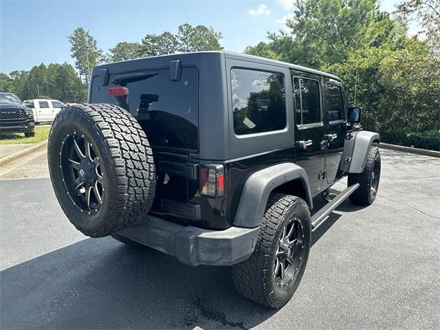 used 2016 Jeep Wrangler Unlimited car, priced at $28,830