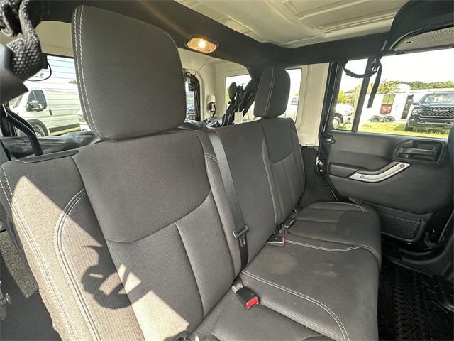 used 2016 Jeep Wrangler Unlimited car, priced at $28,830