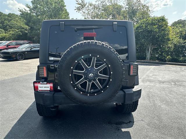 used 2016 Jeep Wrangler Unlimited car, priced at $28,830