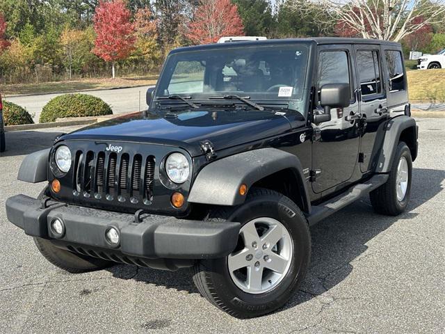 used 2012 Jeep Wrangler Unlimited car, priced at $23,460