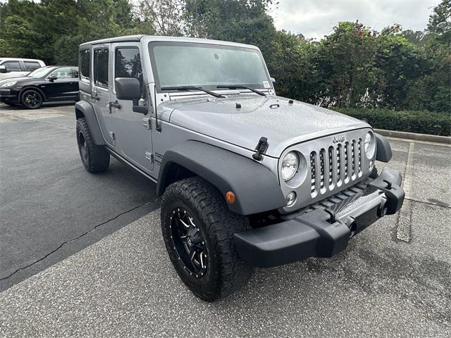 used 2015 Jeep Wrangler Unlimited car, priced at $21,997