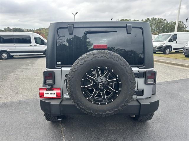 used 2015 Jeep Wrangler Unlimited car, priced at $21,997