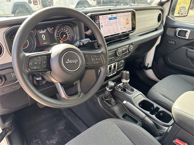 used 2026 Jeep Wrangler car, priced at $36,225