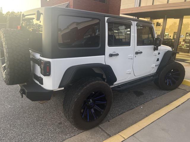 used 2015 Jeep Wrangler Unlimited car, priced at $24,997