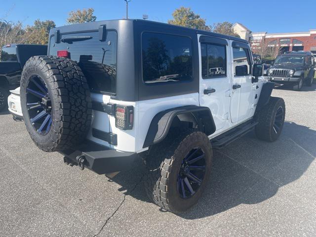 used 2015 Jeep Wrangler Unlimited car, priced at $24,997