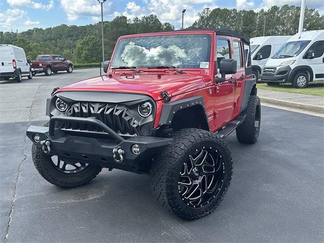 used 2012 Jeep Wrangler Unlimited car, priced at $17,975