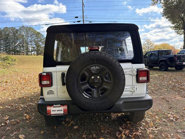 used 2024 Jeep Wrangler car, priced at $33,525