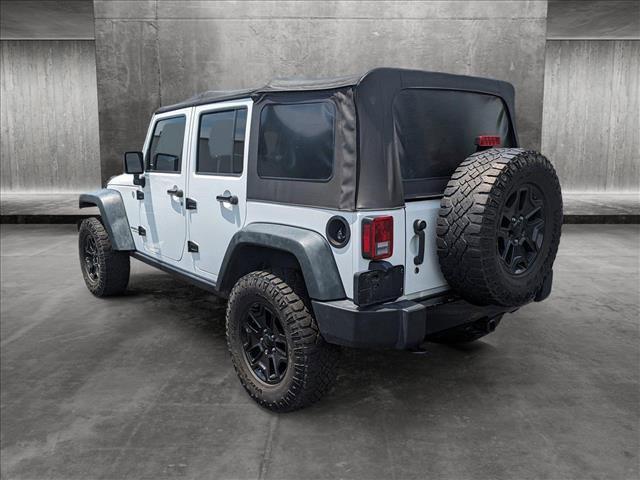used 2014 Jeep Wrangler Unlimited car, priced at $12,498