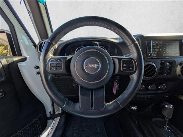 used 2015 Jeep Wrangler Unlimited car, priced at $16,551