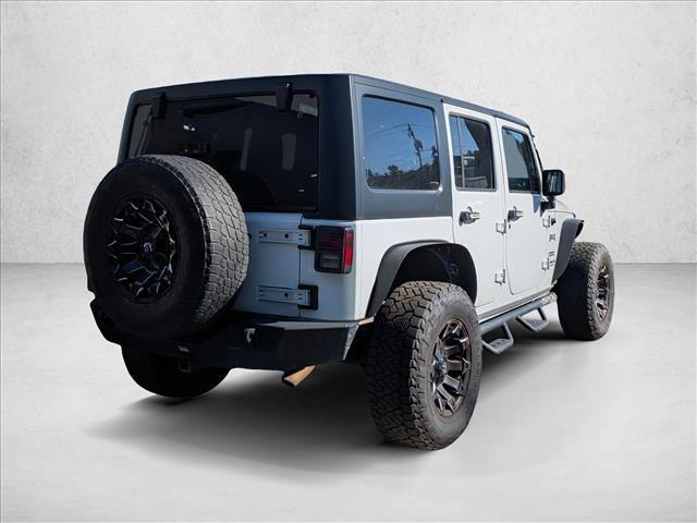 used 2015 Jeep Wrangler Unlimited car, priced at $16,551